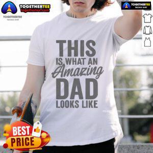 Alt Text: Amazing Dad T-Shirt featuring the phrase 'Nice, This Is What An Amazing Dad Looks Like' in bold lettering.