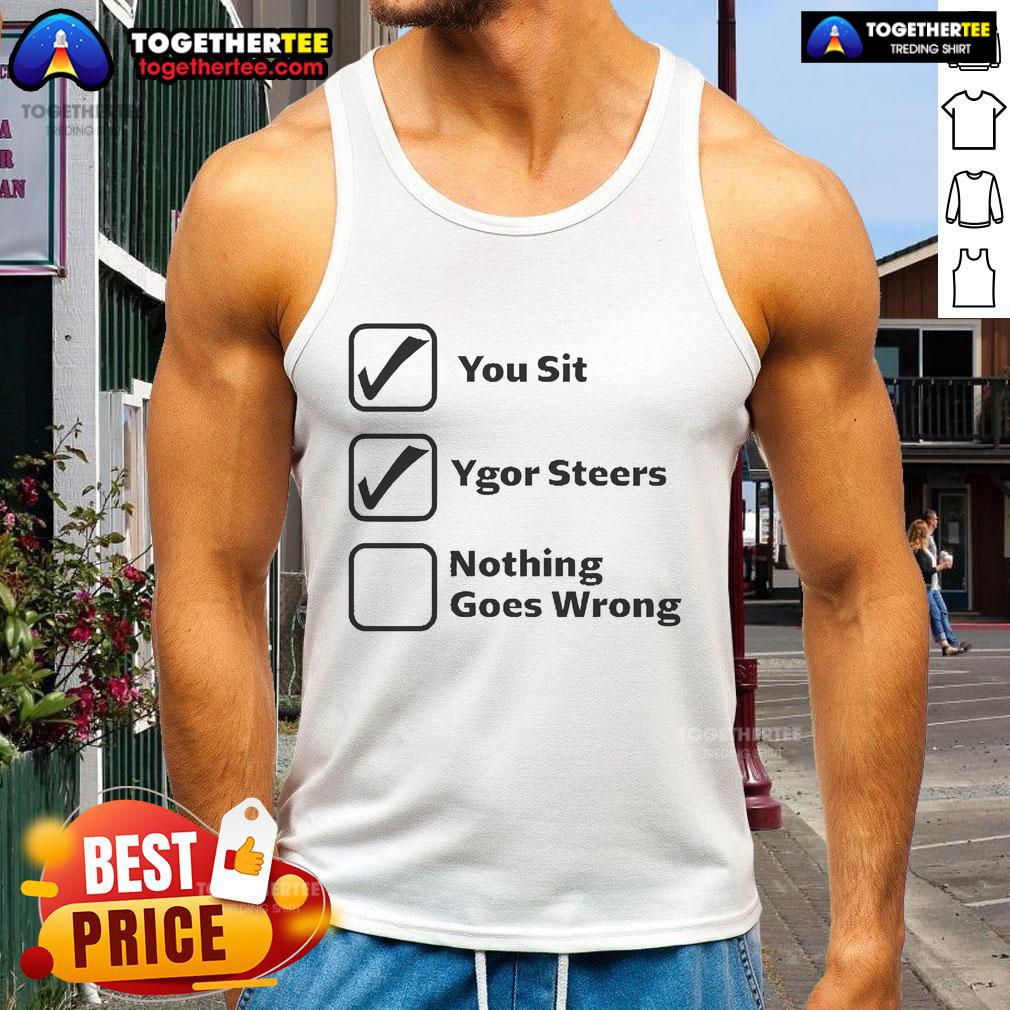 Ygor steers confidently in a stylish 'Nice You Sit' tank top, showcasing a relaxed and carefree vibe.