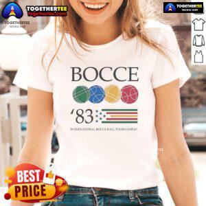 Alt Text: Ladies' tee from the Official Bocce 83 International Bocce Ball Tournament featuring vibrant design and logo.