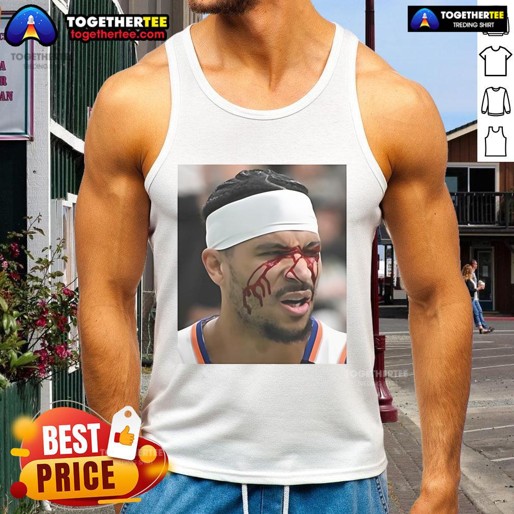 Josh Hart wearing a tank top after taking an elbow to the face during a basketball game, showcasing his determination.