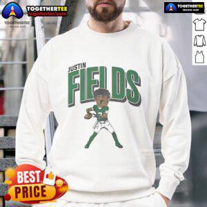 Official Justin Fields New York Jets cartoon sweatshirt featuring vibrant graphics and team colors for fans.