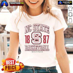 Alt Text: Official NC State Wolfpack Basketball 1887 ladies tee featuring team logo and vibrant red color, perfect for fans.