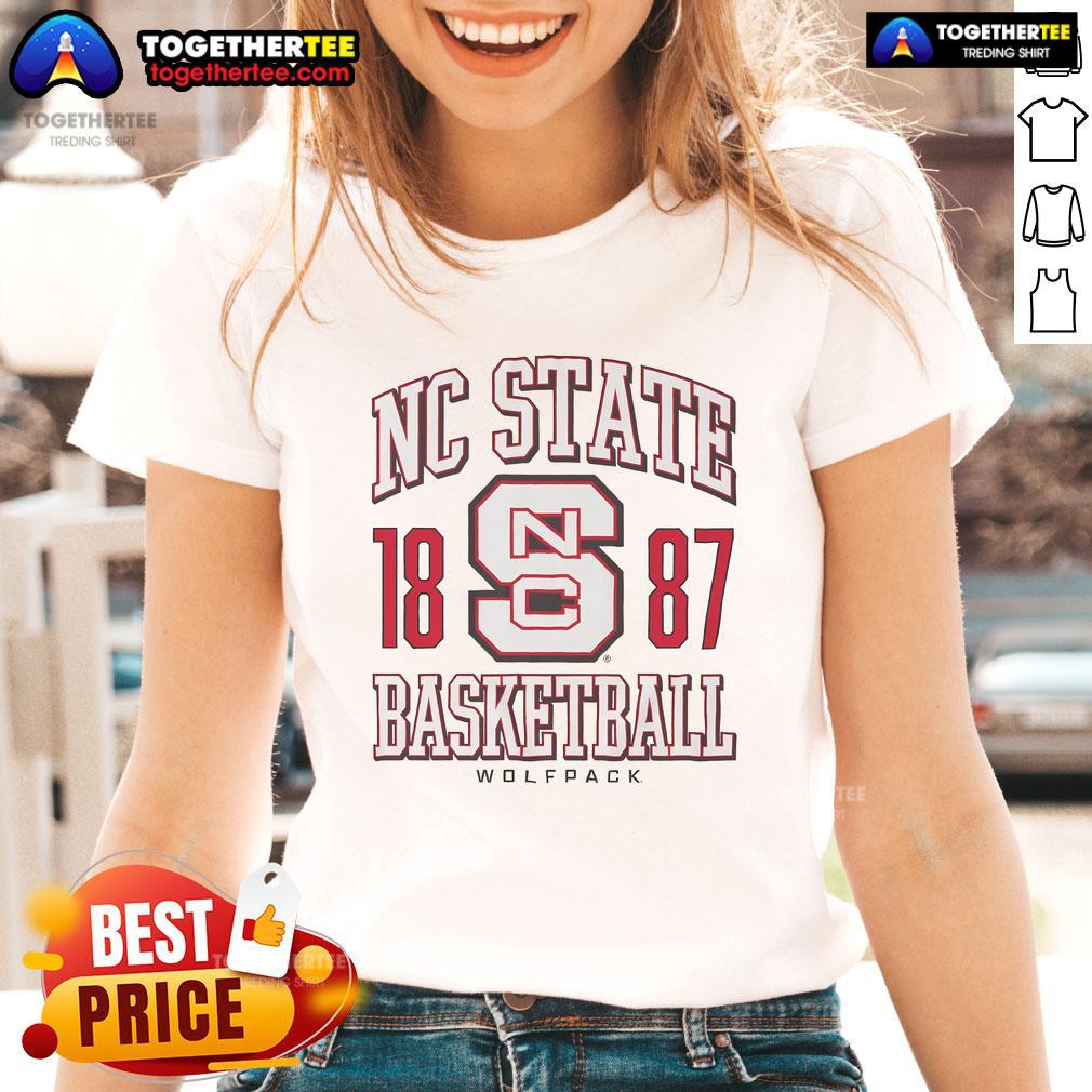 Alt Text: Official NC State Wolfpack Basketball 1887 ladies tee featuring team logo and vibrant red color, perfect for fans.