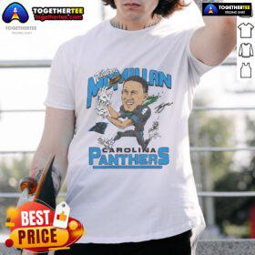 Alt Text: Official Panthers Tetairoa McMillan signature t-shirt featuring vibrant team colors and player branding.