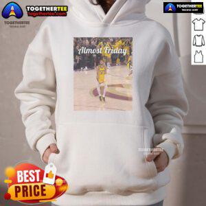 Alt Text: Tyrese Haliburton wearing an Indiana Pacers Big Nuts Almost Friday hoodie, showcasing team spirit and style.