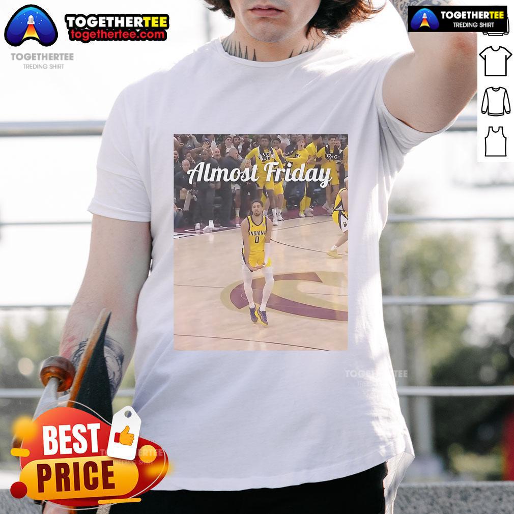 Official Tyrese Haliburton Indiana Pacers Big Nuts Almost Friday T-Shirt featuring vibrant team colors and graphic design.