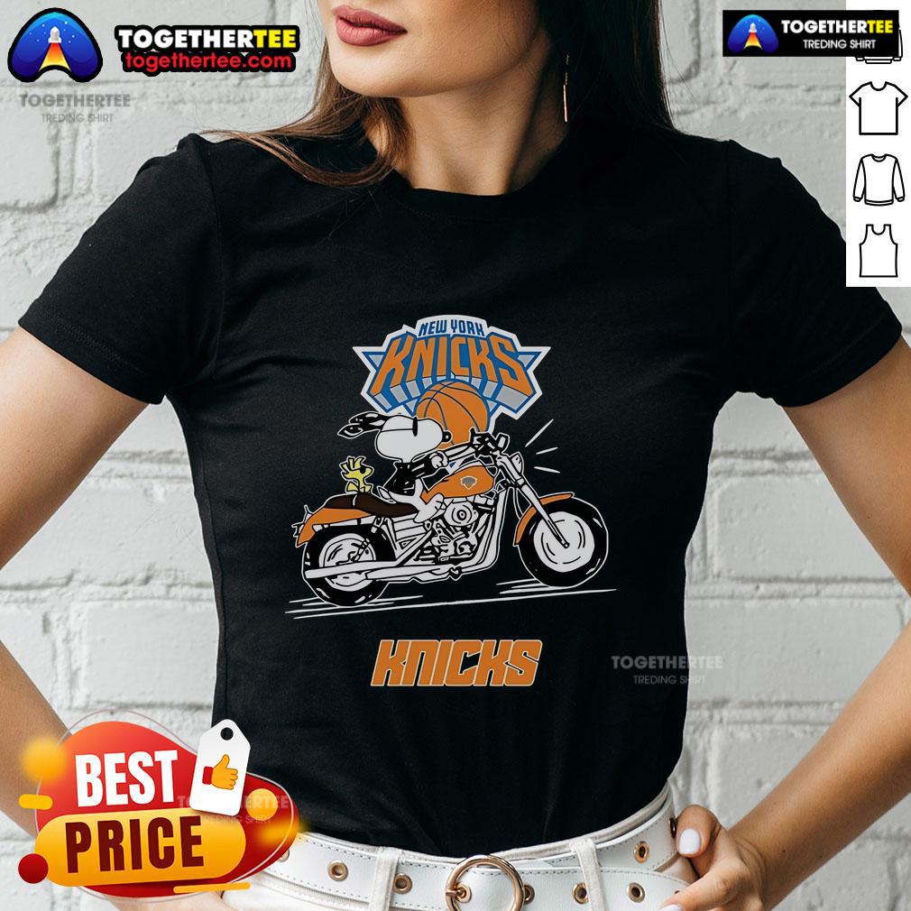 Snoopy and Woodstock driving a motorbike on a New York Knicks ladies tee, showcasing a fun and colorful design.