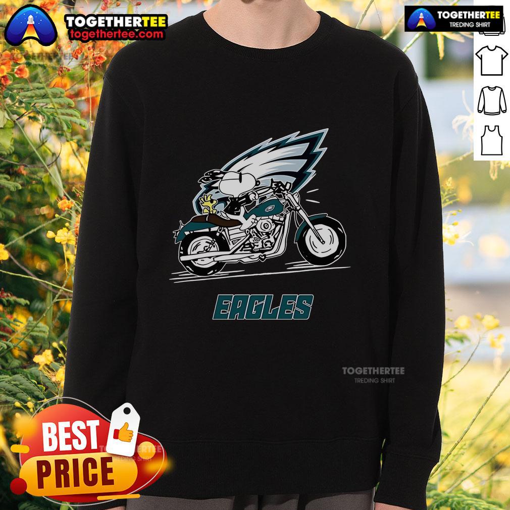 Alt Text: Original Snoopy and Woodstock driving a motorbike on a Philadelphia Eagles sweatshirt design.