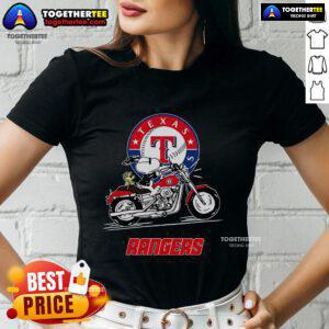 Alt Text: Snoopy and Woodstock riding a motorbike on a Texas Rangers ladies tee, showcasing fun and playful design.