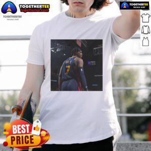 Buddy Hield sports an 'Excluding Buddy' T-shirt, showcasing his unique style as a member of the Original Warriors.