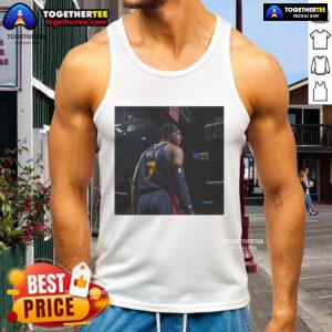 Buddy Hield wearing an Original Warriors tank top, showcasing his unique style and team spirit on the court.