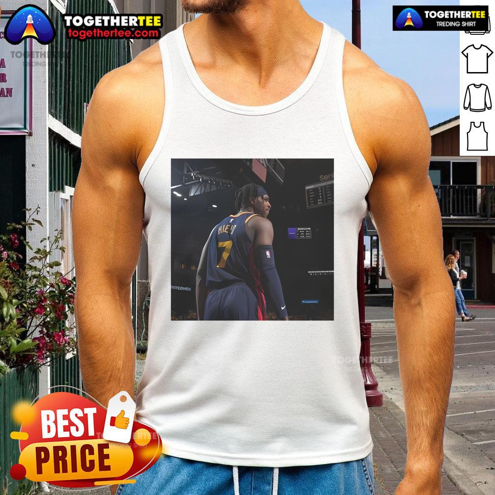 Buddy Hield wearing an Original Warriors tank top, showcasing his unique style and team spirit on the court.