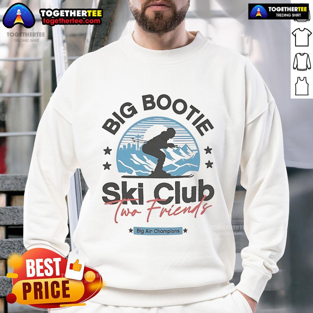 Two friends wearing the Premium Big Bootie Ski Club Big Air Champions Sweatshirt, enjoying winter fun in the snow.