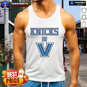 Alt Text: Woman wearing a stylish New York Knicks V tank top, showcasing team spirit and fashion in vibrant colors.