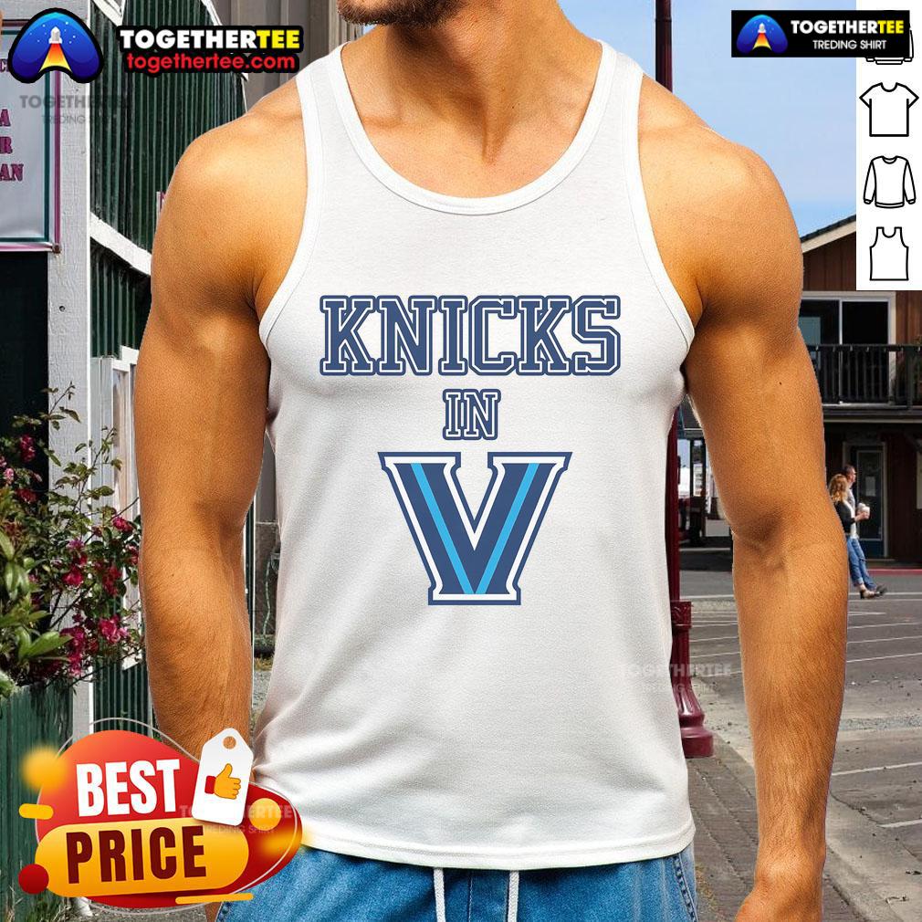 Alt Text: Woman wearing a stylish New York Knicks V tank top, showcasing team spirit and fashion in vibrant colors.