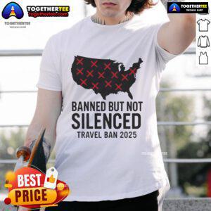 Alt Text: Protest T-shirt featuring 'Hot Banned But Not Silenced Trump Travel Ban 2025' slogan at a rally.