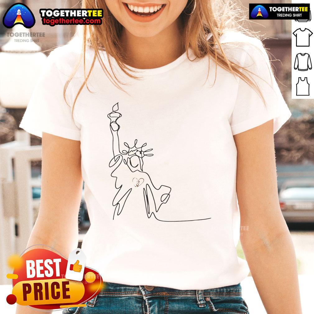Stylish ladies' tee featuring a beautiful drawing of the Statue of Liberty, perfect for patriotic fashion enthusiasts.