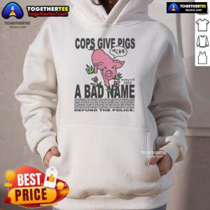 Official Cops Give Pigs a Bad Name Hoodie featuring bold graphic design and playful text on a stylish black background.