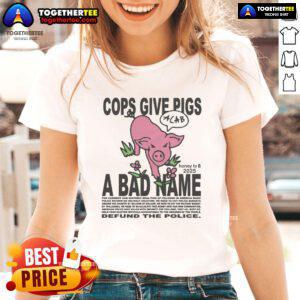 Alt Text: Official Cops Give Pigs A Bad Name Ladies Tee featuring a humorous pig graphic and bold text design.