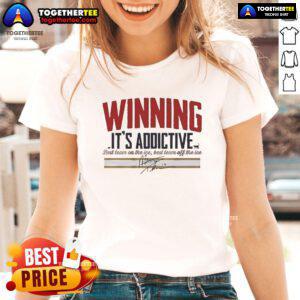 Alt Text: Official Matthew Tkachuk Winning It's Addictive Signature Ladies Tee featuring stylish design and vibrant colors.