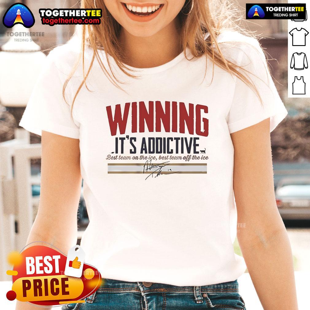 Alt Text: Official Matthew Tkachuk Winning It's Addictive Signature Ladies Tee featuring stylish design and vibrant colors.