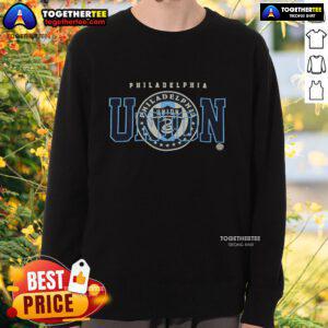 Official Philadelphia Union see-thru sweatshirt featuring team colors and logo, perfect for fans and casual wear.