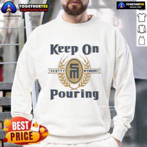 Alt Text: Official Scotty McCreery Keep On Pouring Sweatshirt featuring a stylish design, perfect for fans and casual wear.