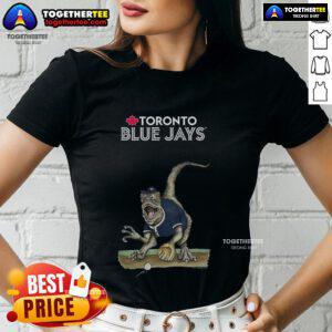 Alt Text: Official Toronto Blue Jays Tiny Turnip Velociraptor Ladies Tee featuring a fun dinosaur graphic for fans.