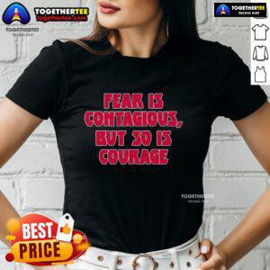 James B. Jones wearing 'Fear Is Contagious But So Is Courage' ladies tee, promoting courage through inspirational fashion.