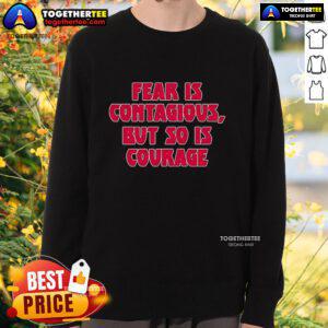 James B. Jones wearing 'Fear Is Contagious, But So Is Courage' sweatshirt, showcasing empowering message on courage.