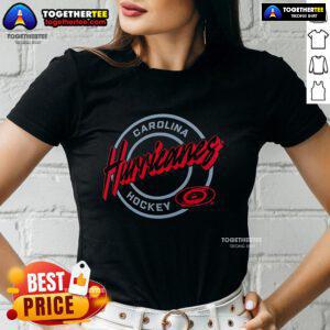 Premium Carolina Hurricanes Hockey Colorblock Puck Logo Ladies Tee featuring team colors and logo for stylish fans.