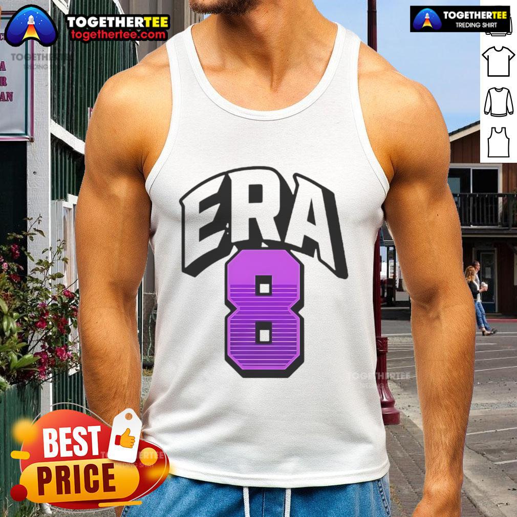 Lamar Jackson wearing an Era8 tank top, showcasing his style and athleticism in a vibrant urban setting.