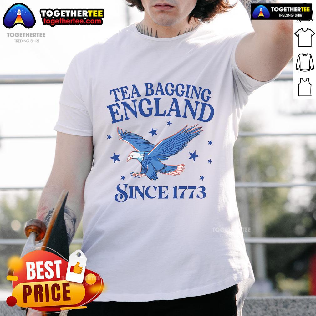 Alt Text: Patriotic eagle T-shirt featuring 'Good Tea Bagging England Since 1773' slogan, perfect for tea lovers and England fans.