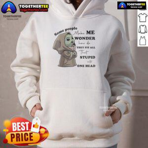 Adorable Baby Yoda in a cozy hoodie, showcasing a whimsical design that sparks curiosity and laughter.