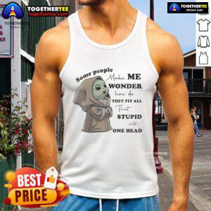 Cute Baby Yoda wearing a humorous tank top, showcasing a playful design that sparks curiosity and laughter.