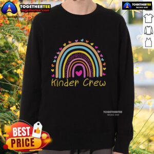 Alt Text: Kindergarten teacher wearing a Nice Kinder Crew rainbow heart sweatshirt, promoting a positive classroom vibe.