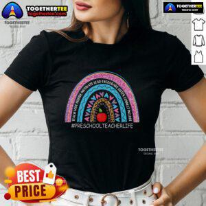 Nice preschool teacher wearing a rainbow tee with 'Love, Inspire, Lead, Motivate' text, perfect for educators.