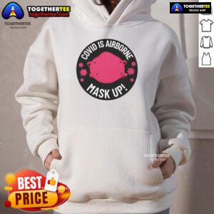 Alt Text: Official Covid Is Airborne Mask Up logo on a stylish hoodie, promoting safety and awareness during the pandemic.