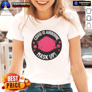 Official Covid Is Airborne Mask Up logo on a stylish ladies tee, promoting health awareness and safety.