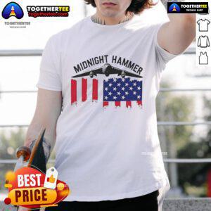 Official Midnight Hammer USA Flag T-Shirt featuring a bold American flag design on a stylish, comfortable tee.