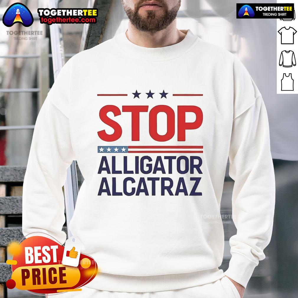Official Stop Alligator Alcatraz Protest Sweatshirt featuring bold text and unique design for eco-conscious activists.