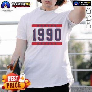 Alt Text: Official The Valley Nia Sanchez 1990 T-Shirt featuring a vibrant design and vintage style, perfect for fans.