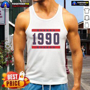 Nia Sanchez wearing the Official The Valley 1990 tank top, showcasing a stylish design and vibrant colors.