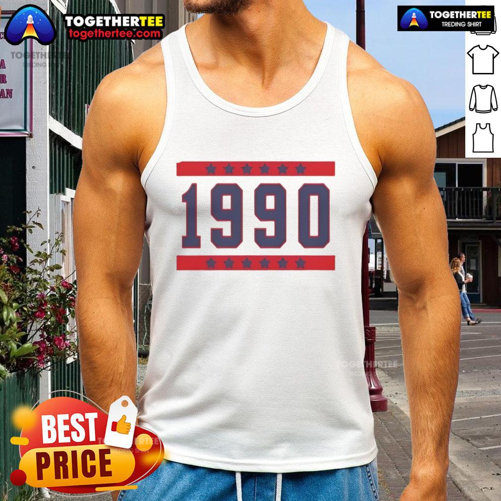 Nia Sanchez wearing the Official The Valley 1990 tank top, showcasing a stylish design and vibrant colors.