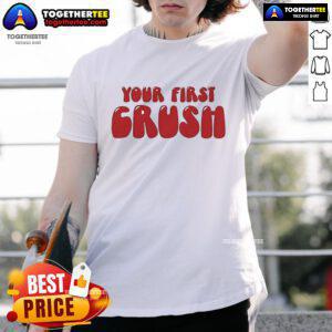 Official Trish Stratus 'With Your First Crush' T-Shirt featuring a stylish design for wrestling fans and collectors.