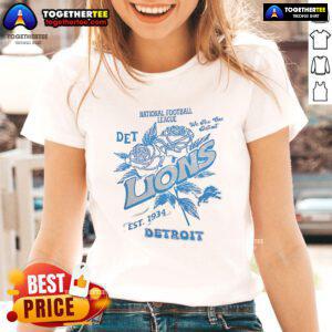 Original Detroit Lions ladies tee, NFL established 1934, featuring team logo and stylish design for fans.