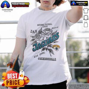 Alt Text: Original Jacksonville Jaguars T-Shirt featuring the NFL logo, established in 1995, perfect for fans and collectors.