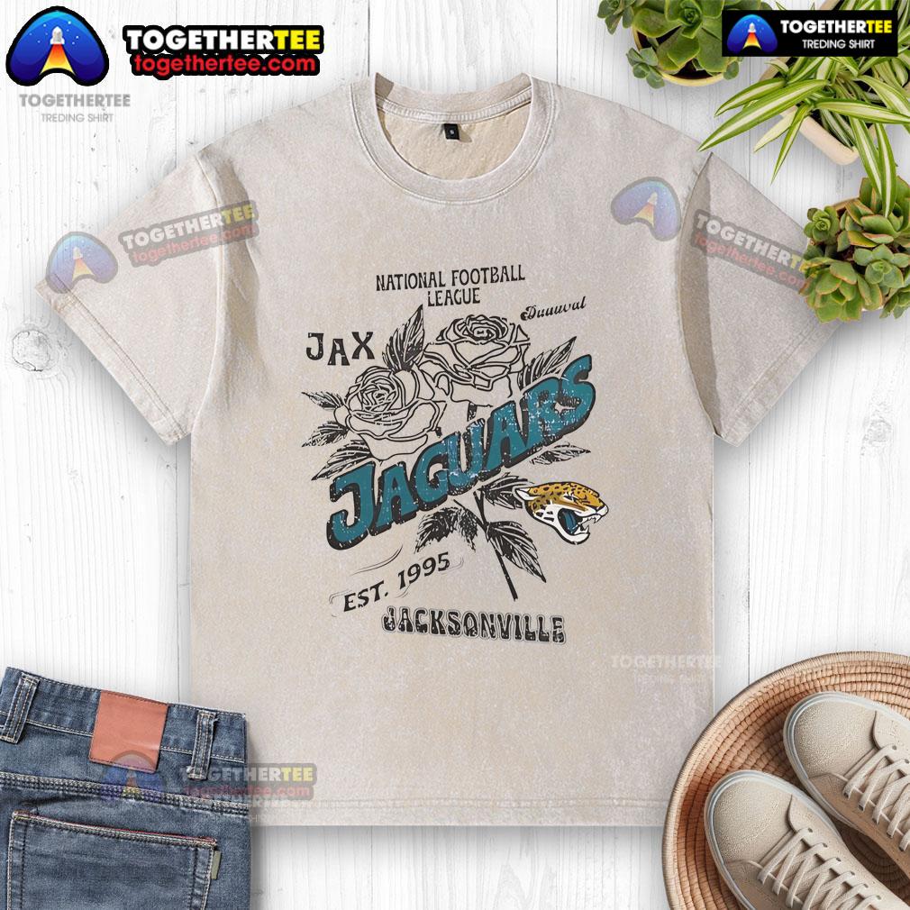 Alt Text: Original Jacksonville Jaguars washed t-shirt, NFL established 1995, featuring team logo and vintage design.