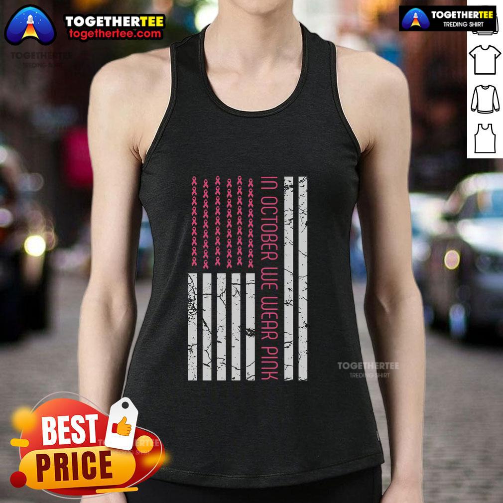 Pretty in October: Women wearing pink America flag tank tops for Breast Cancer Awareness Month.