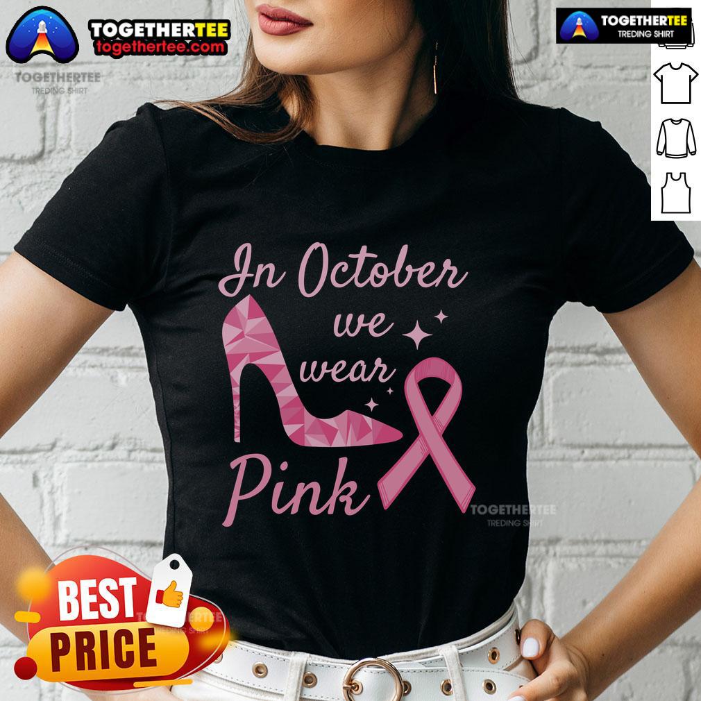 Pretty in October: Women in pink high heel ribbon tees, embracing fall fashion with style and elegance.